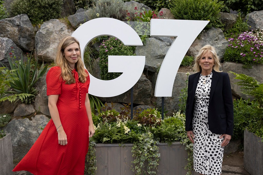 Carrie Symonds plays with son Wilfred as she joins Jill Biden on beach walk