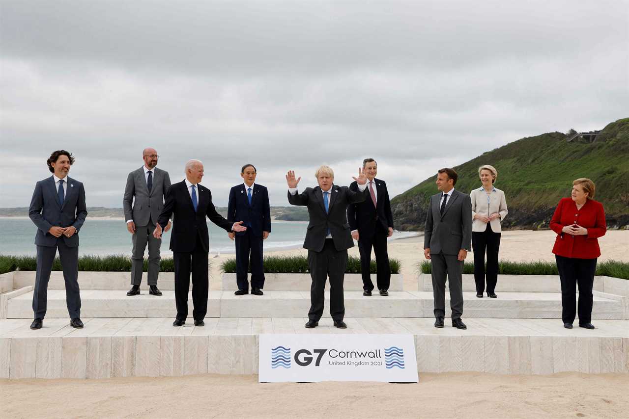 Boris Johnson and Carrie Symonds elbow bump world leaders on G7 beach as Jill Biden jokes it’s ‘like a wedding!’