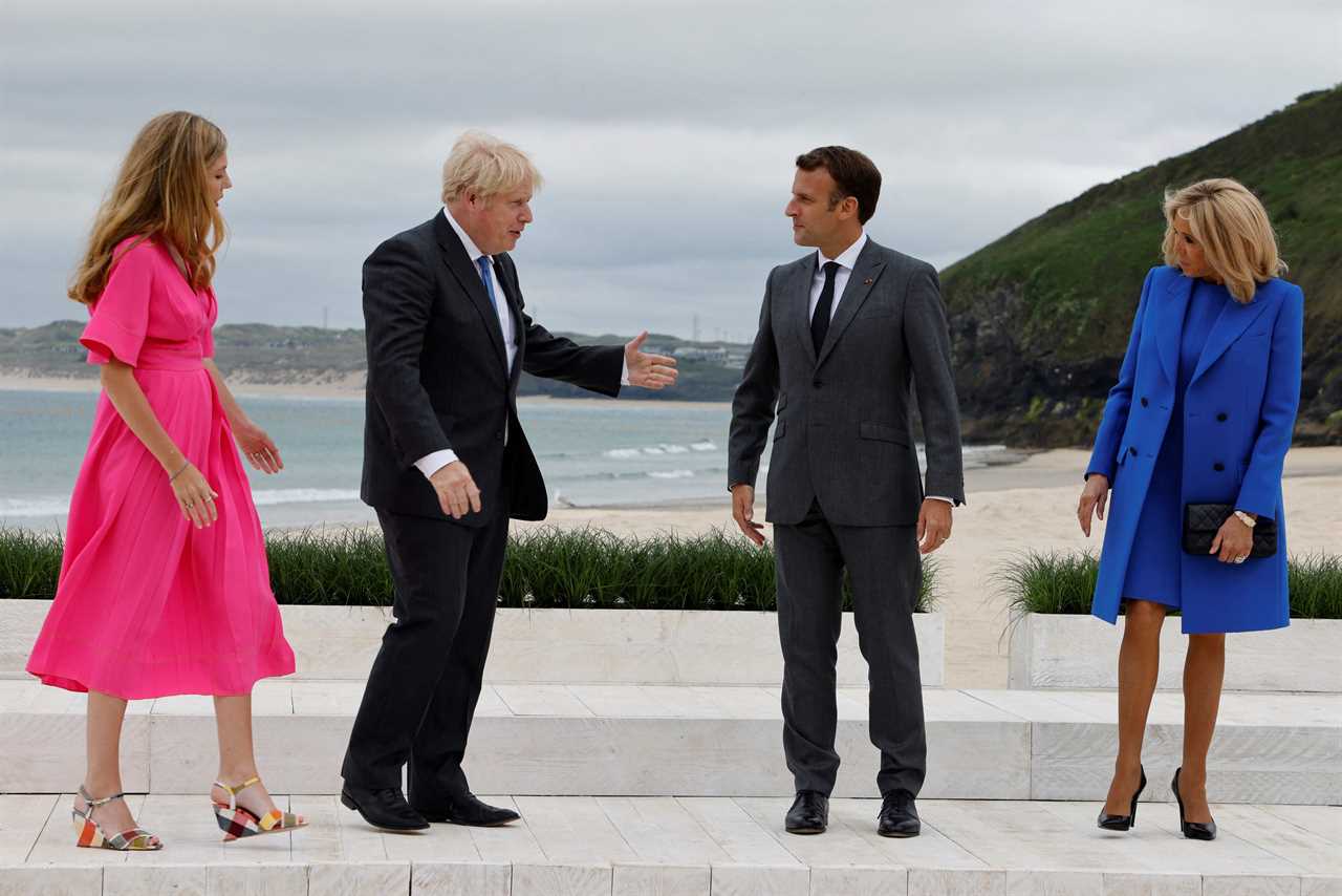 Boris Johnson and Carrie Symonds elbow bump world leaders on G7 beach as Jill Biden jokes it’s ‘like a wedding!’