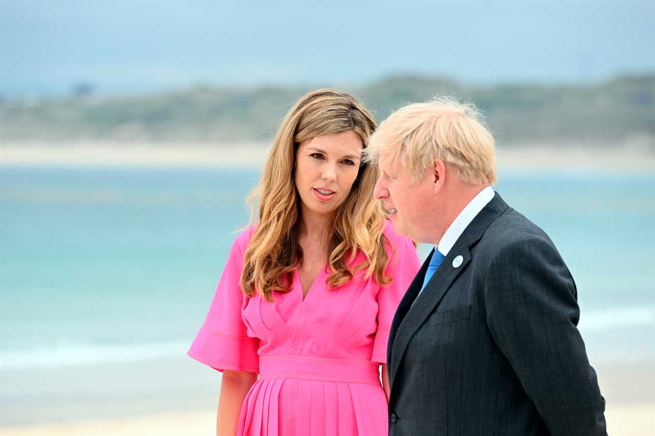 Boris Johnson and Carrie Symonds elbow bump world leaders on G7 beach as Jill Biden jokes it’s ‘like a wedding!’