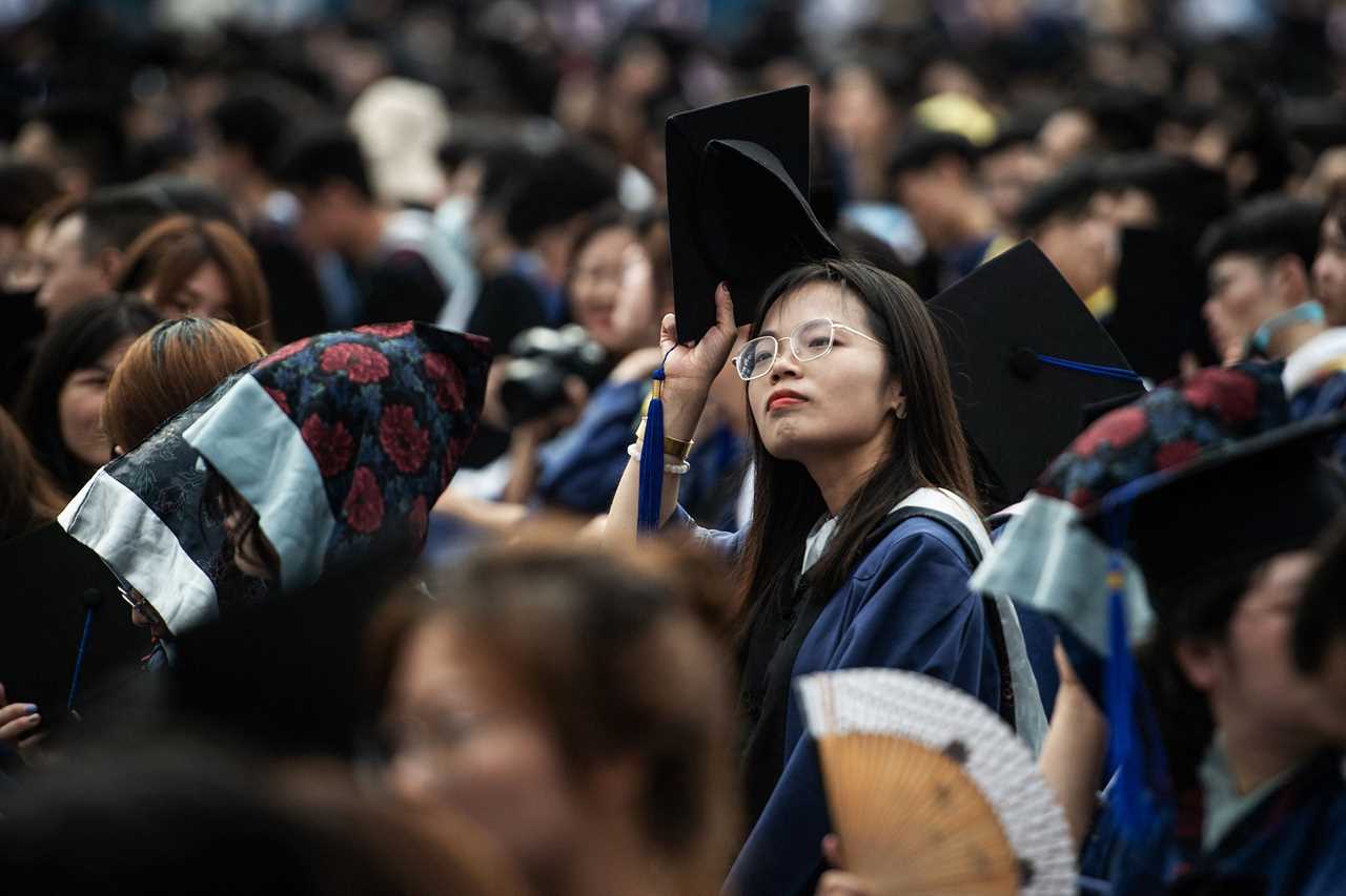 Thousands gather in Wuhan as rest of world continues to battle Covid