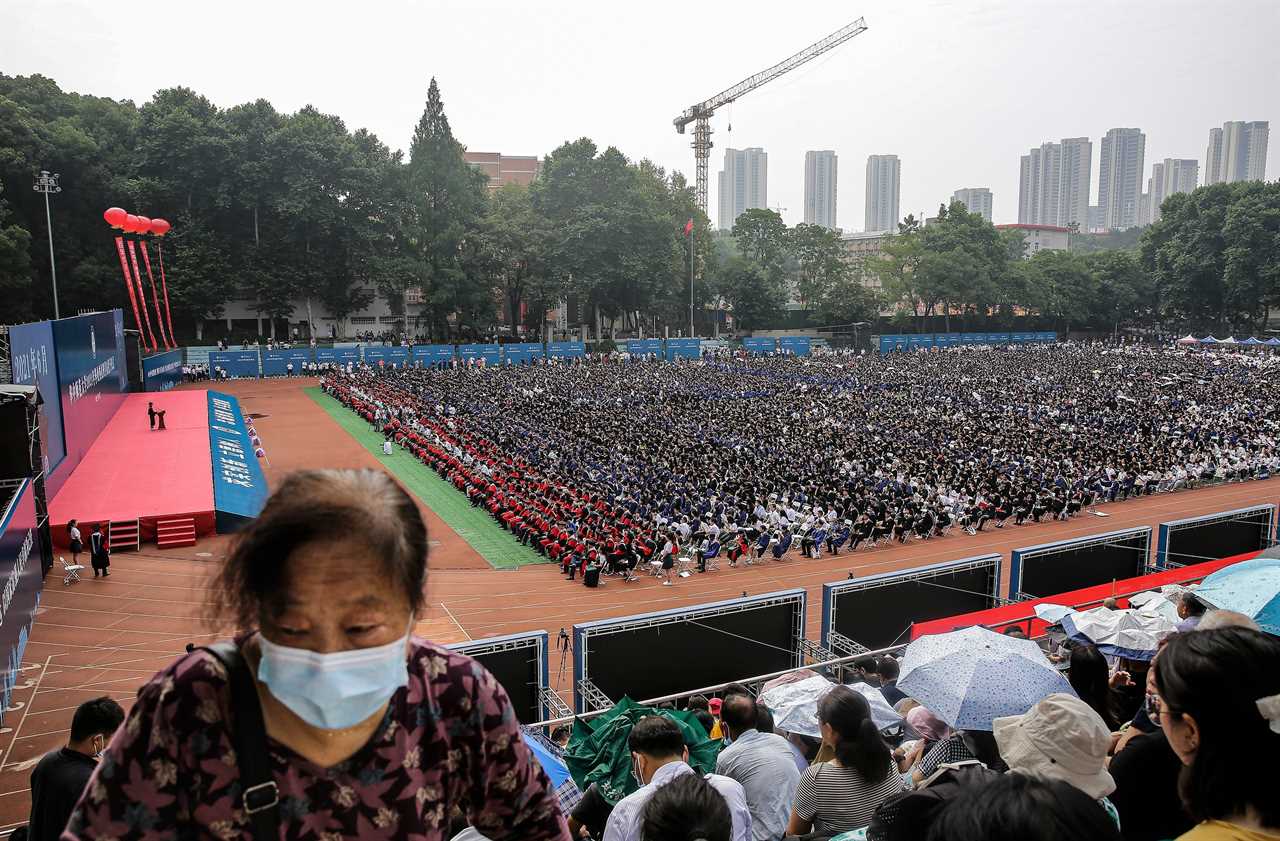 Thousands gather in Wuhan as rest of world continues to battle Covid