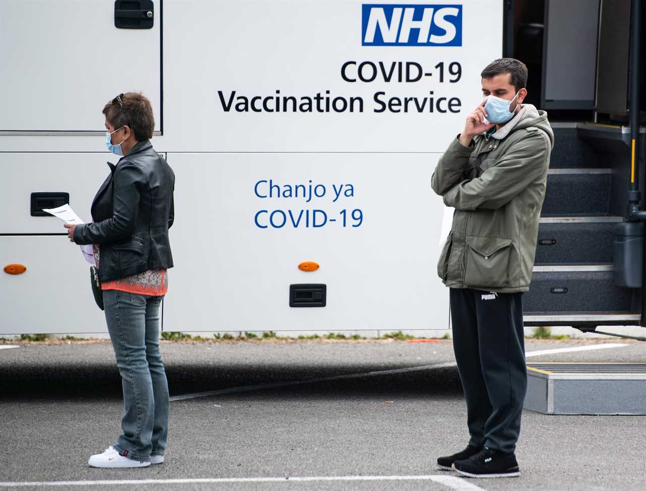 Hundreds queue outside Covid vaccine centres as they open their doors to walk-in patients