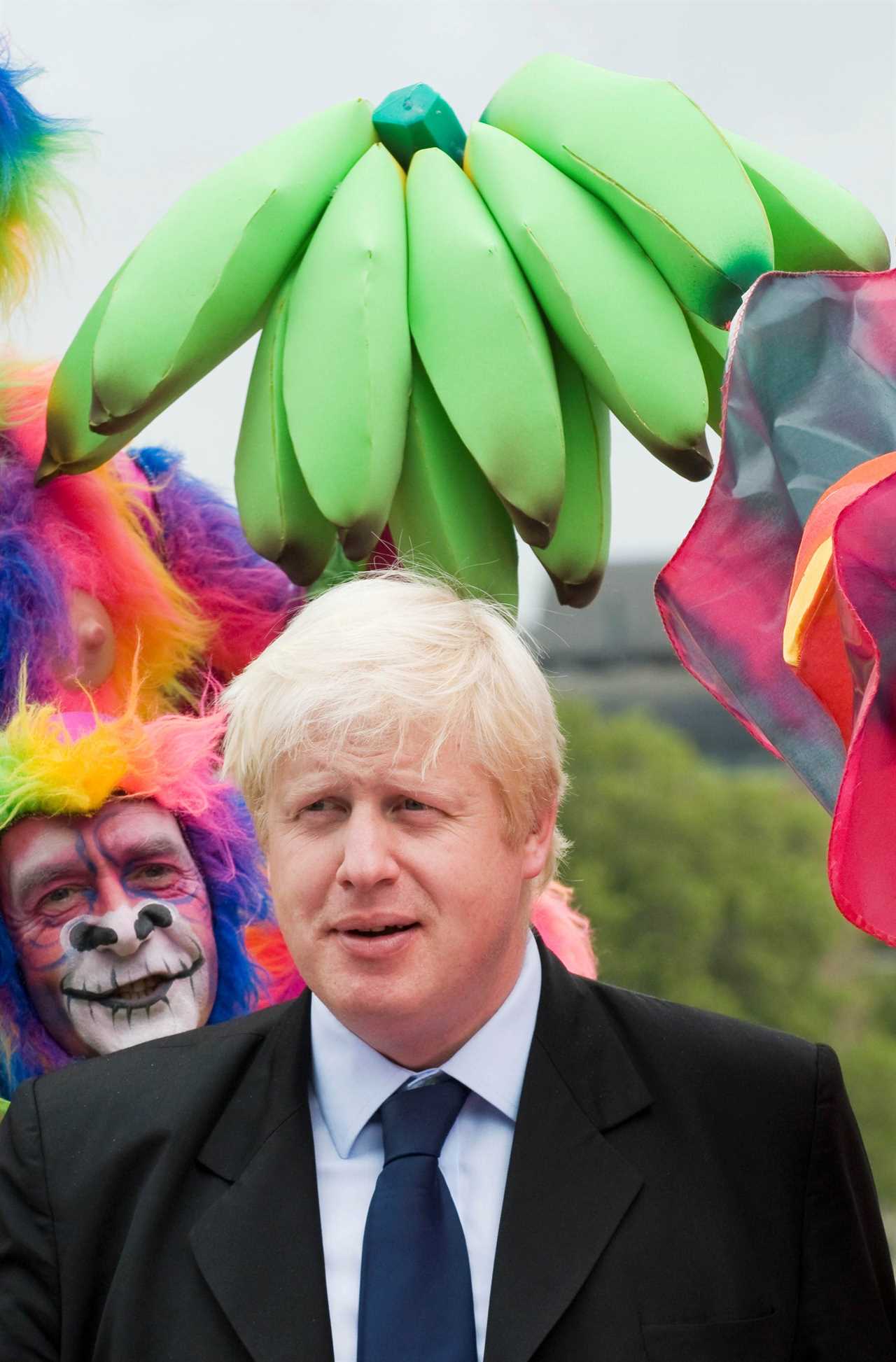 Boris Johnson left red-faced after snaps emerge of him posing with rainbow-coloured monkey with a fake penis