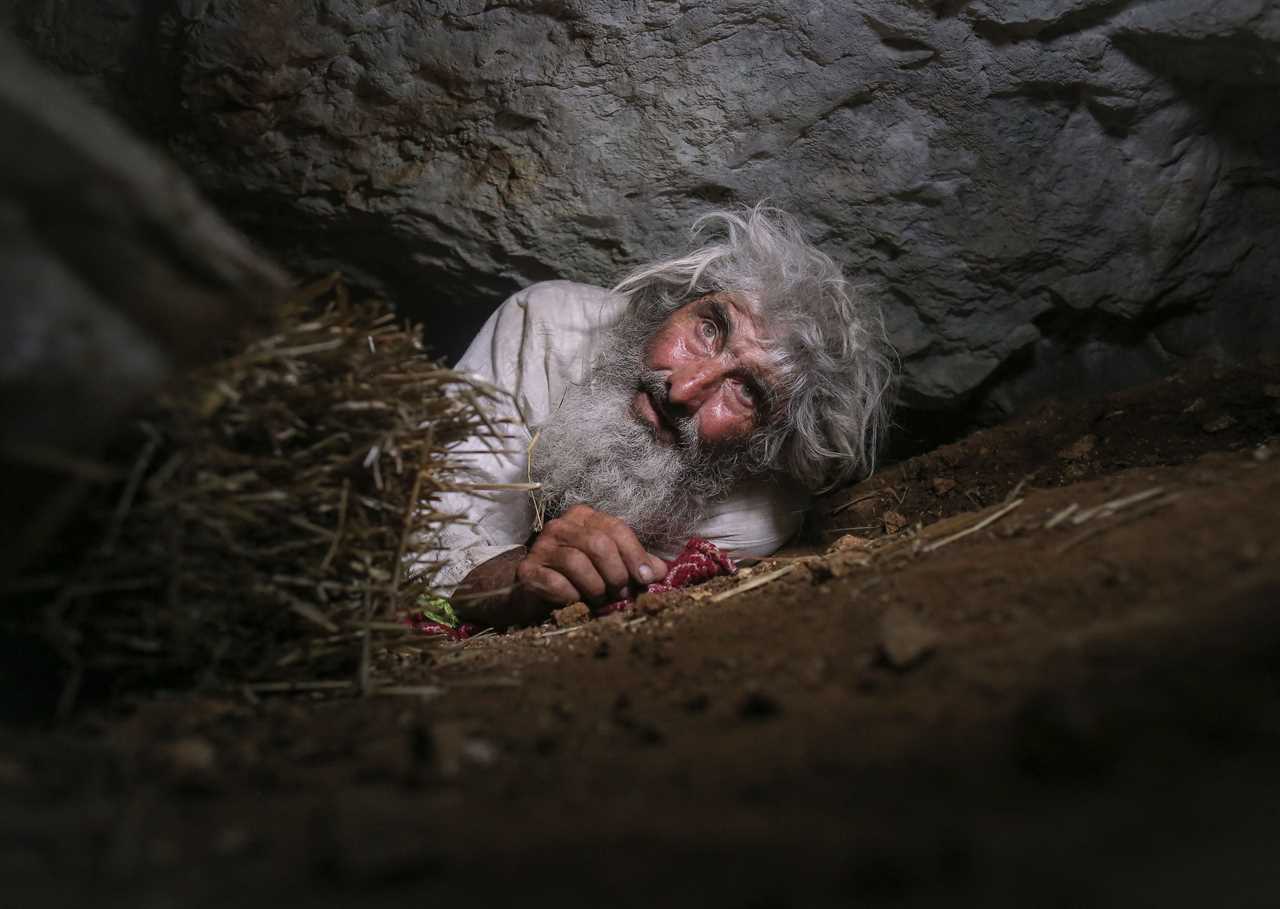 Hermit, 70, leaves tiny cave in Siberia for first time in 20 years to get Covid jab