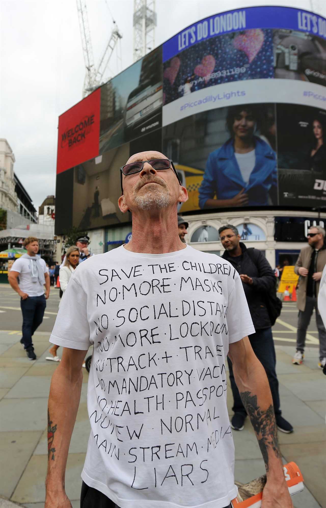 Anti-vaxxer mob storm Covid testing centre during lockdown protest as rallies March in London and Manchester