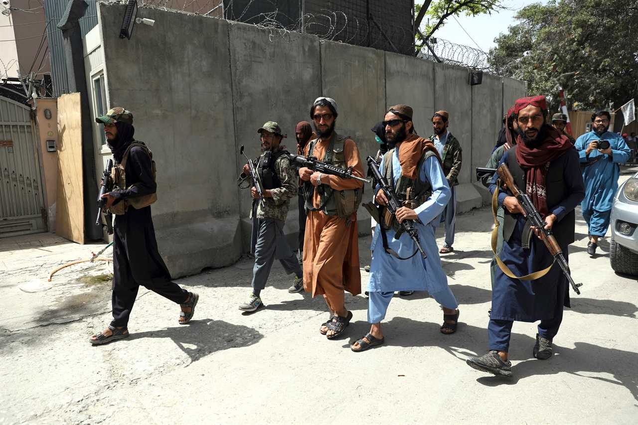 Taliban fighters patrol in Wazir Akbar Khan neighbourhood in the city of Kabul Credit: AP