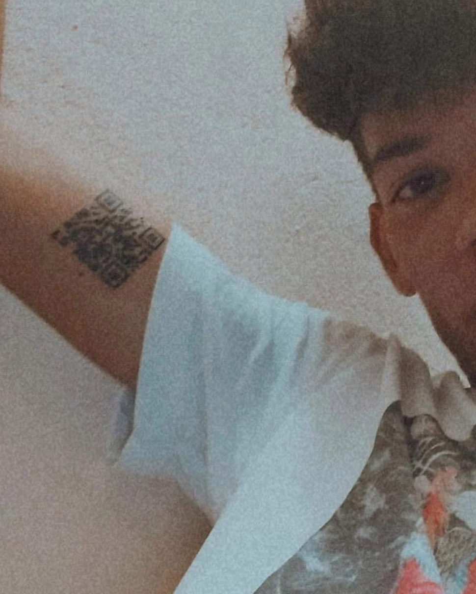 Italian student, 22, who tattooed Covid certificate barcode on ARM becomes TikTok star after scanning into McDonald’s