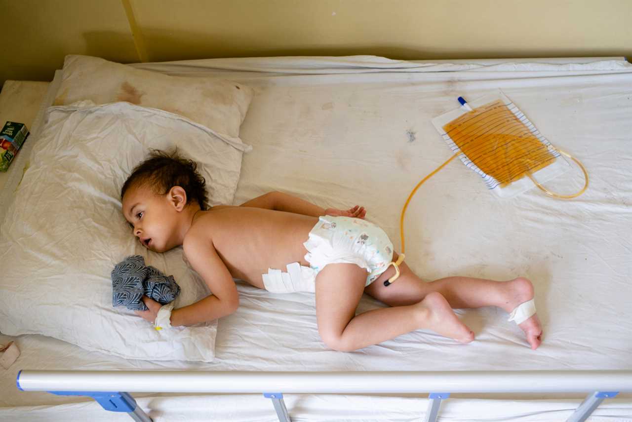 Mum begs UK authorities to rescue baby boy bound for Britain now fighting for his life in Kabul after airport bombing