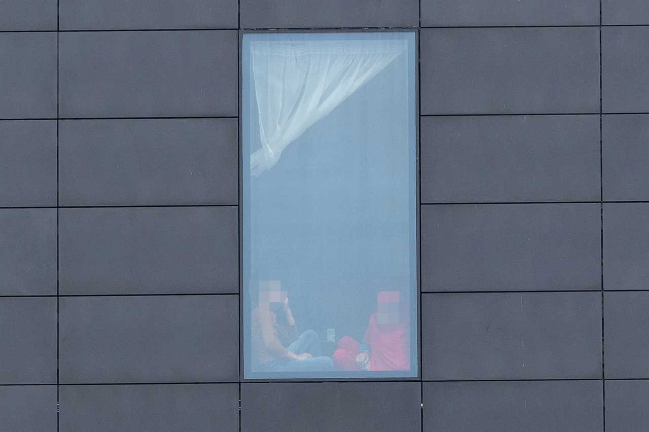 Afghan refugees pictured in quarantine hotel rooms as minister admits there’s not enough room to house all 15,000