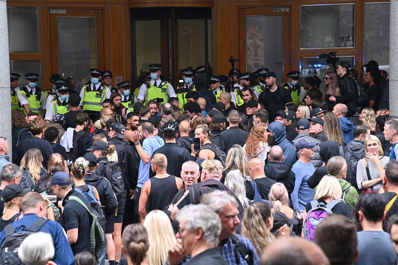 Anti-vaccine mob clashes with cops as they try to storm medicine watchdog building over jabs