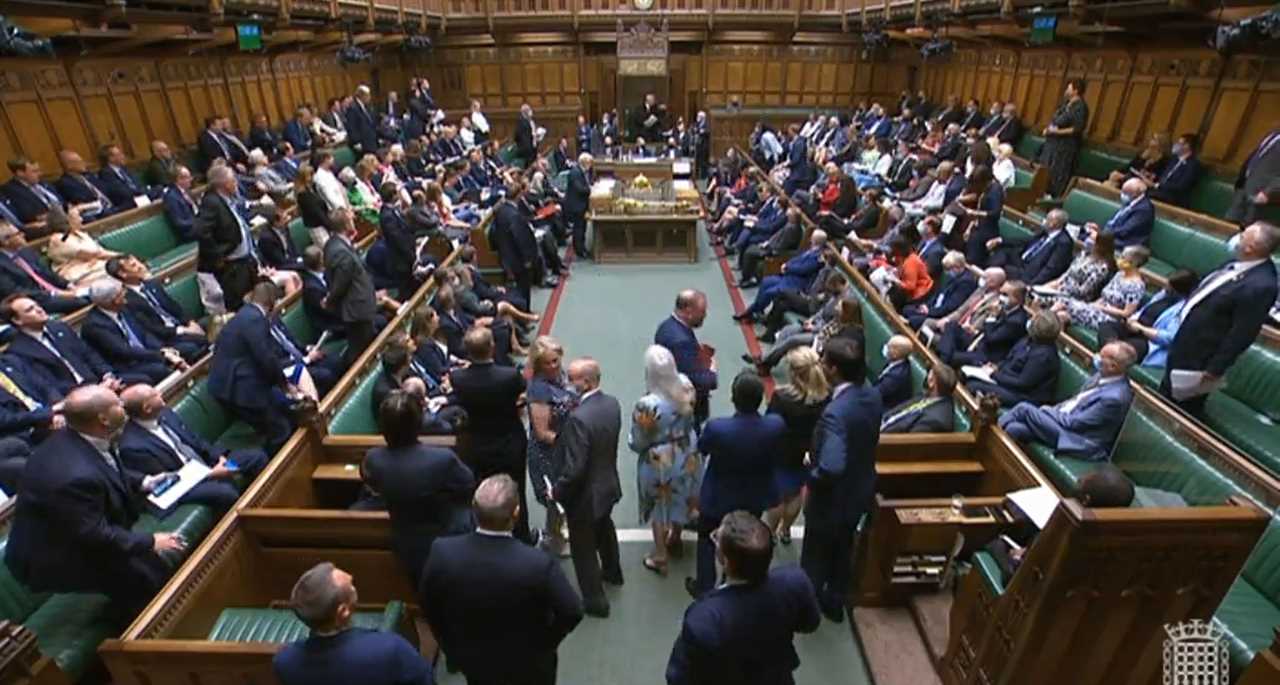 Why do MPs stand up in Parliament during PMQs