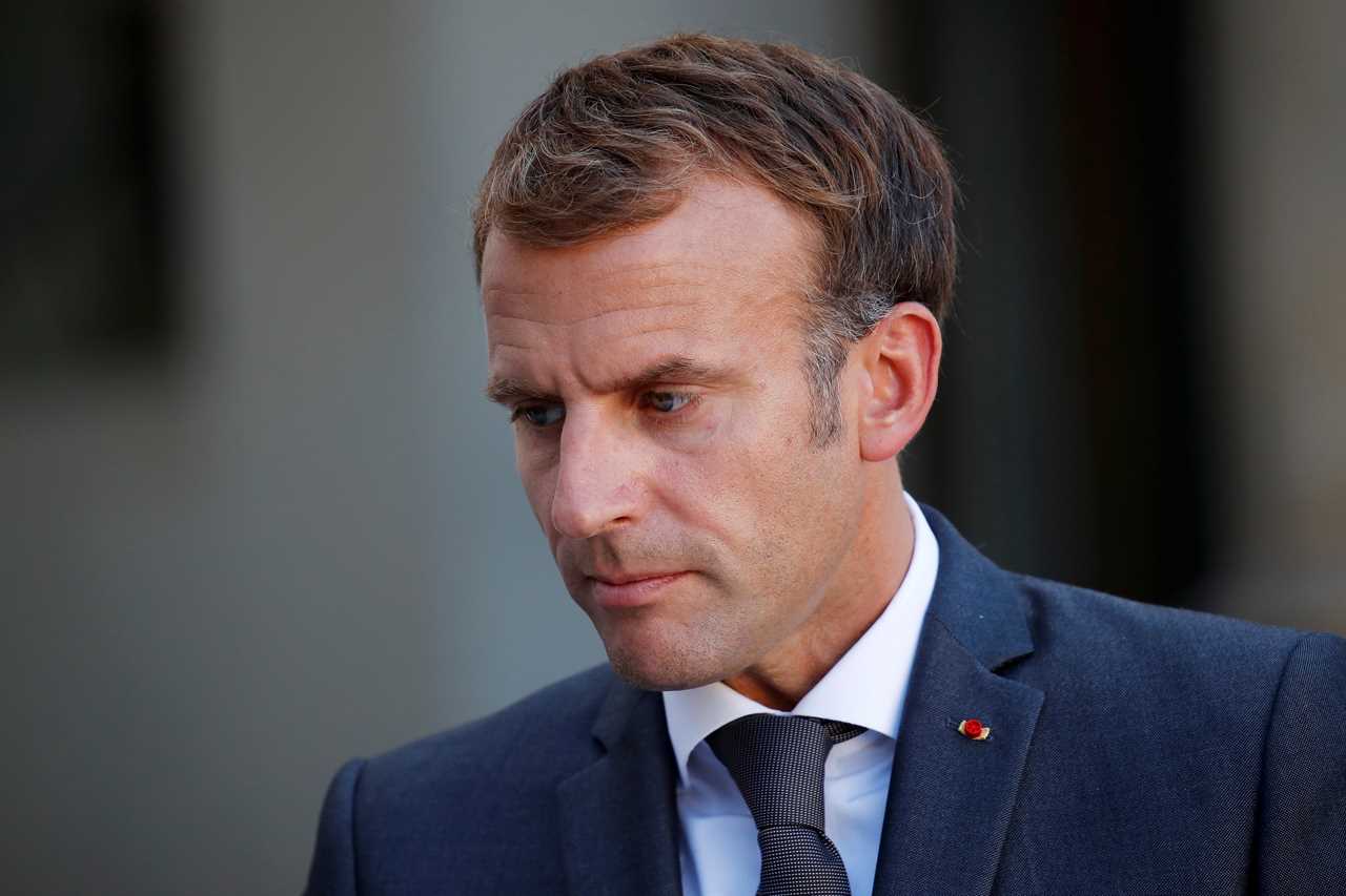 Grumpy Emmanuel Macron snubs olive branch from Boris Johnson following war of words over defence pact