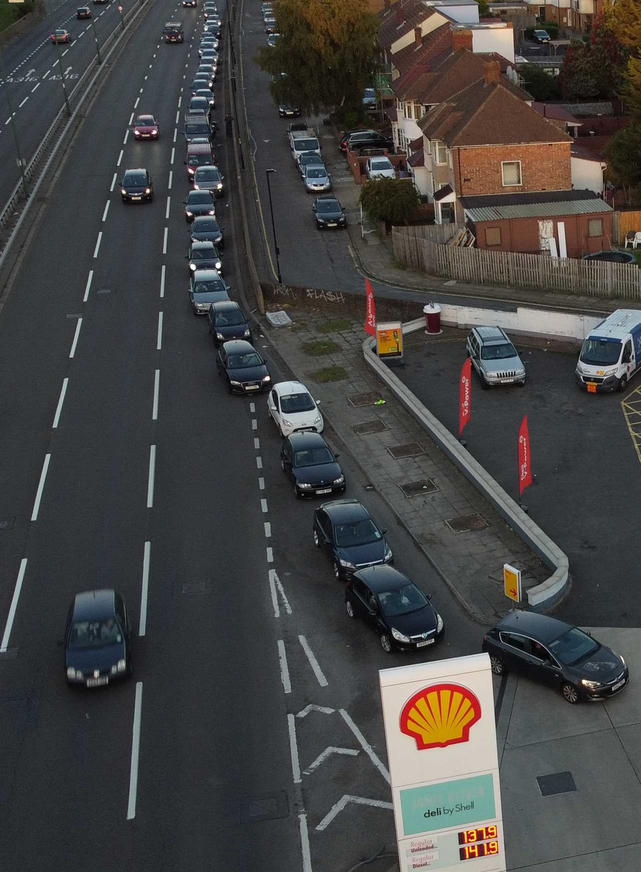 Drivers queue overnight AGAIN for fuel as cops man petrol stations – but gov insists it’s getting better