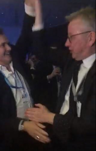 Michael Gove at it again as he dances arm-in-arm with MP to Whitney Houston at Tory conference party