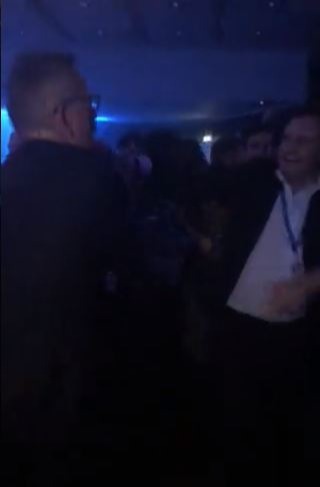 Michael Gove at it again as he dances arm-in-arm with MP to Whitney Houston at Tory conference party