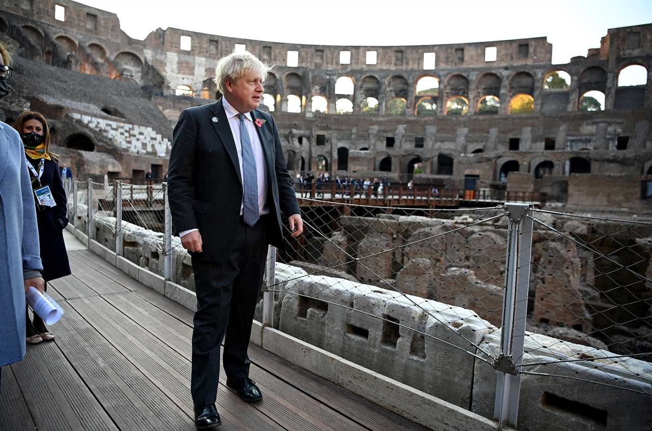 Power hungry Macron squeezes his way between Boris Johnson and Italian PM as leaders gather for G20