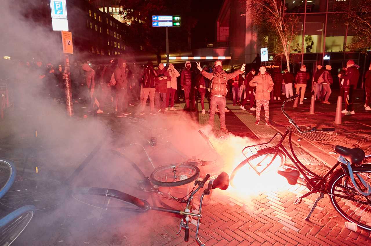 Dutch protesters blasted with water cannons by riot cops as lockdown returns amid Covid surge across Europe