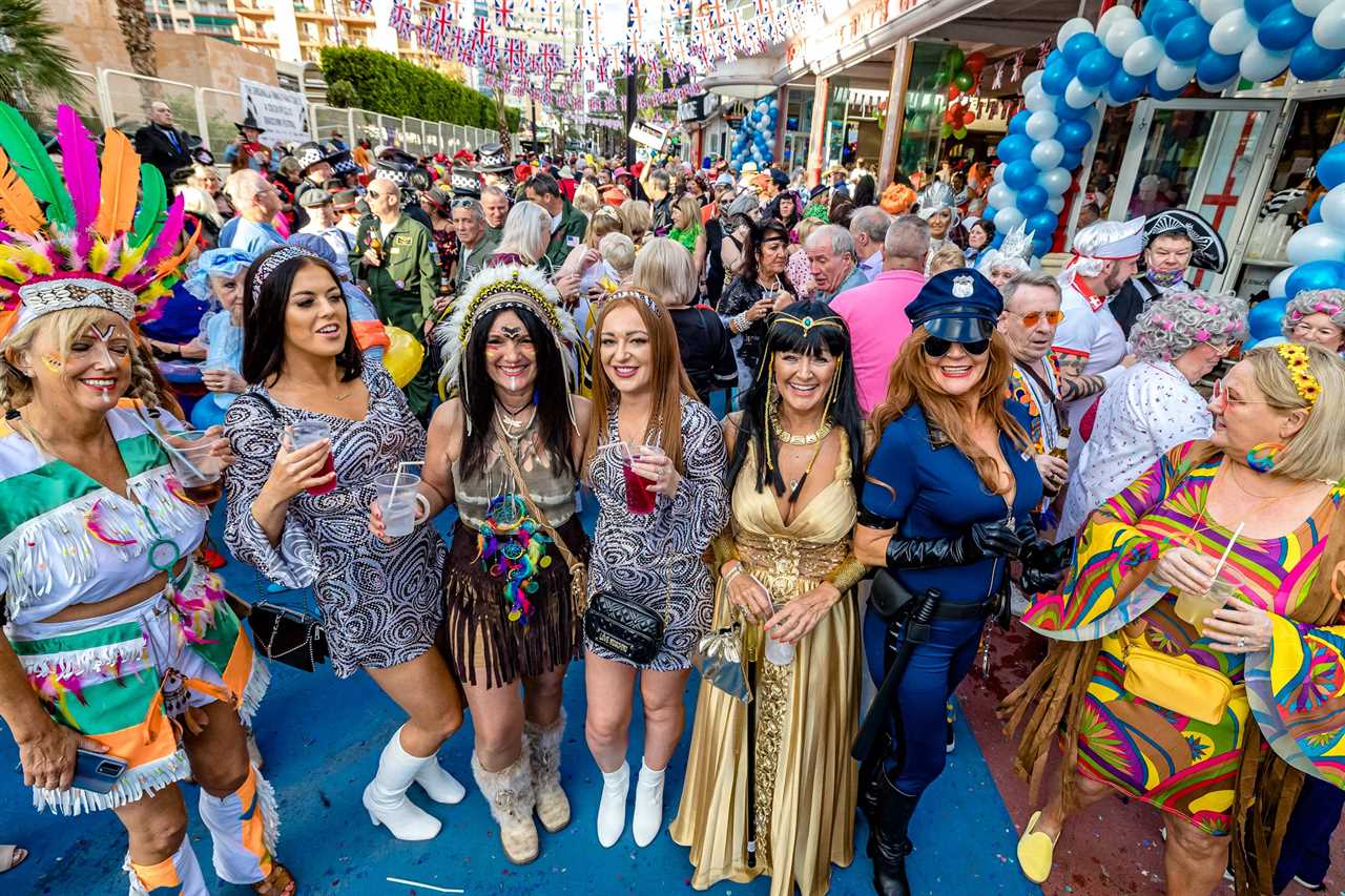 Benidorm’s fancy dress party sees up to 20,000 boozy Brits shrug off Covid fears as they hit resort bars
