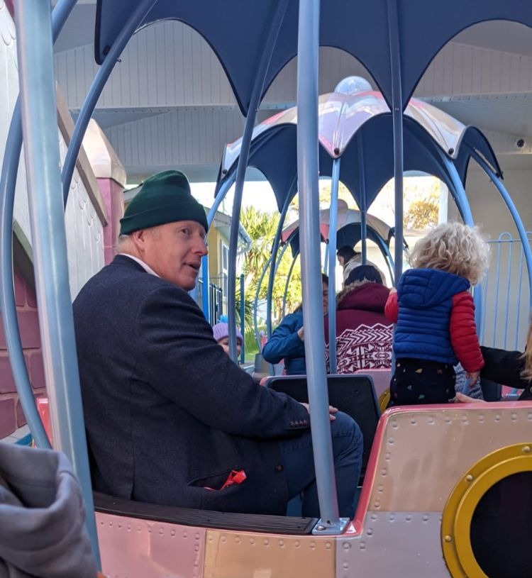 Boris Johnson enjoys a family day out at Peppa Pig World with wife Carrie and son Wilfred