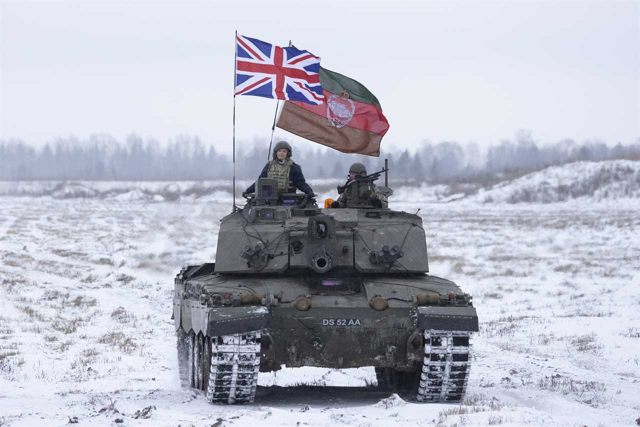 Liz Truss channels Margaret Thatcher in a British tank as she warns Vladmir Putin against invasion plans