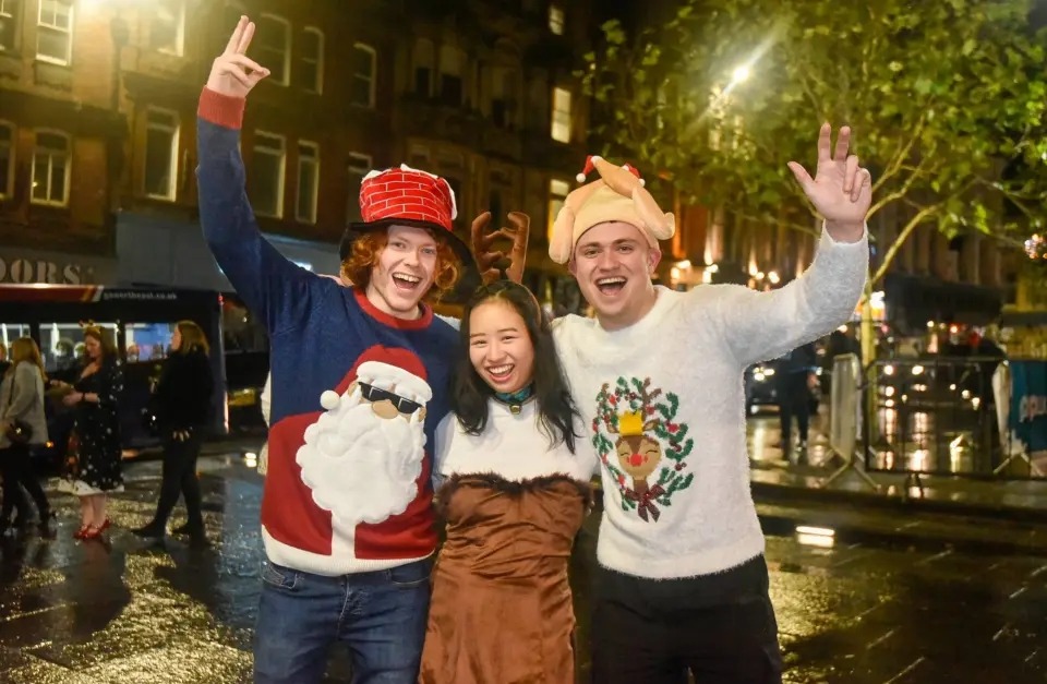 Revellers hit the town for rowdy pre-Christmas partying before Plan B Covid restrictions hit