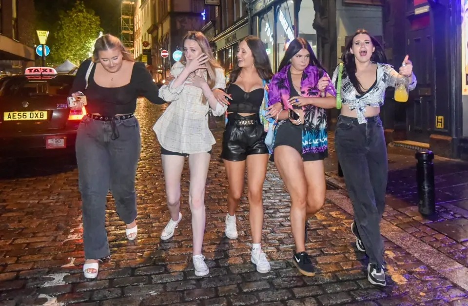 Revellers hit the town for rowdy pre-Christmas partying before Plan B Covid restrictions hit