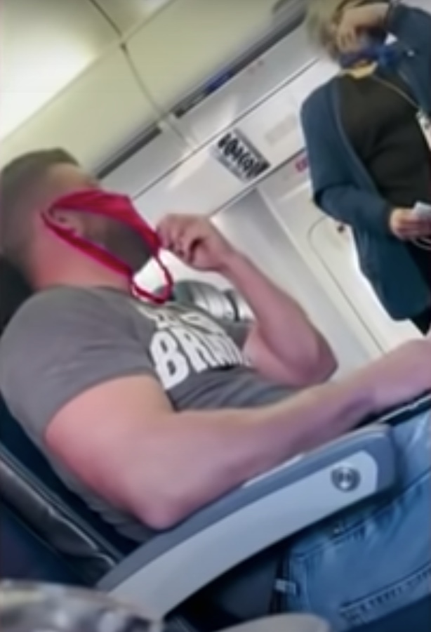 Shocking moment United Airlines passenger wears THONG on his face instead of Covid mask as he’s kicked off flight