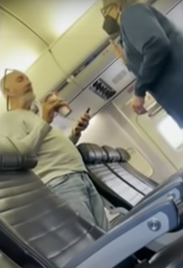 Shocking moment United Airlines passenger wears THONG on his face instead of Covid mask as he’s kicked off flight