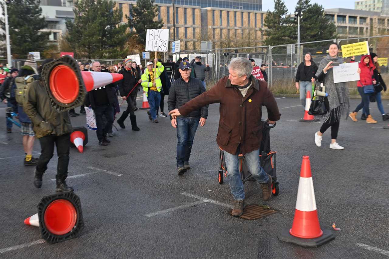 Cops hunt ‘disgraceful’ anti-vaxx thug who stormed Covid test site and took vital equipment