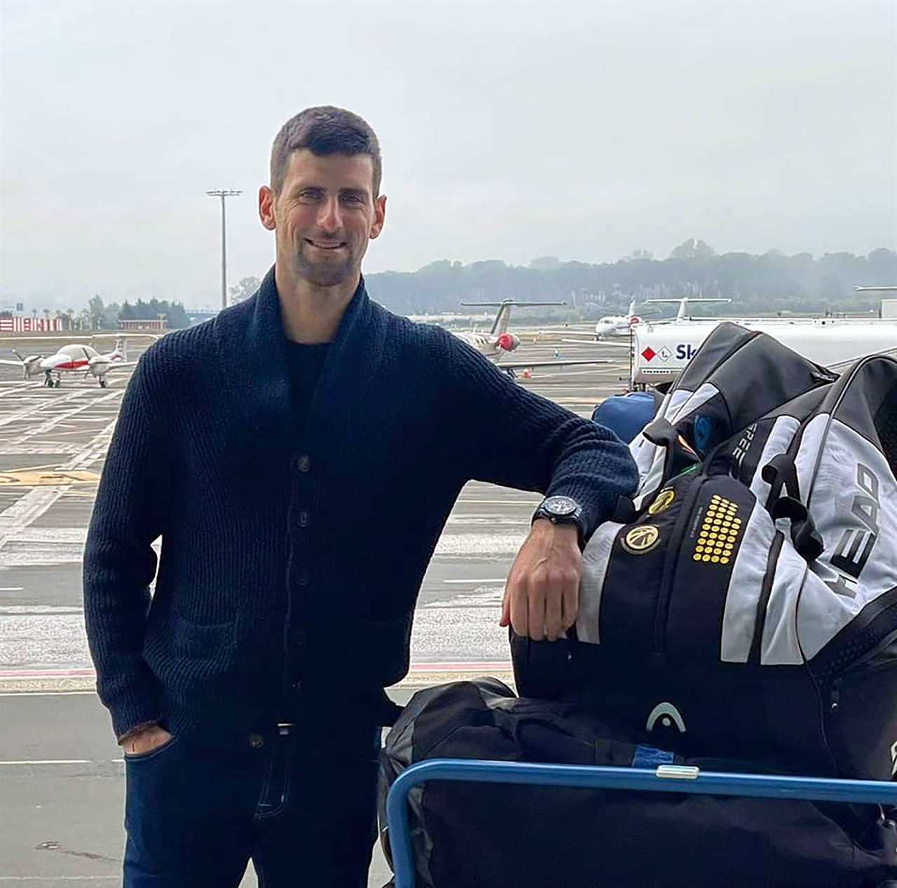 Novak Djokovic allowed to enter Australia as he had Covid last month, tennis star’s lawyers say in vaccine row