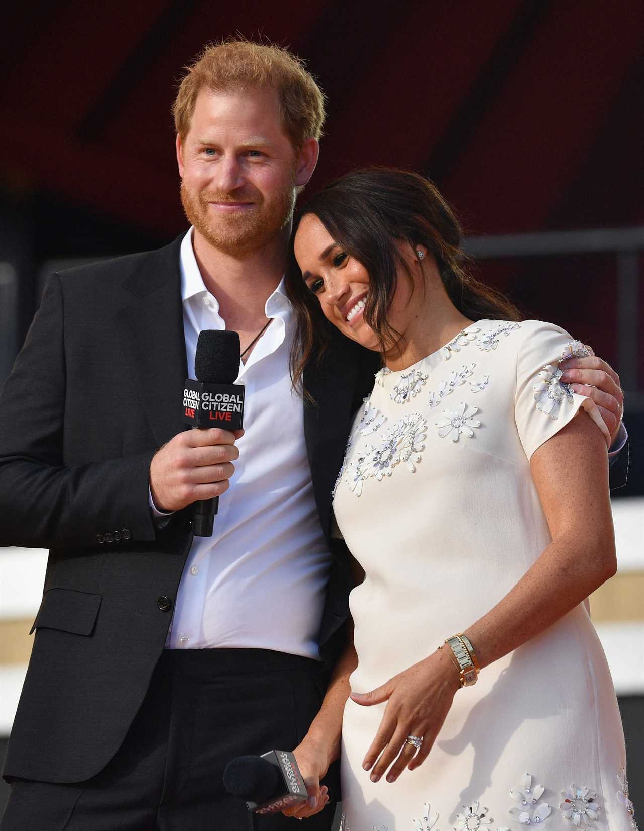Meghan Markle and Prince Harry stick with £18million podcast deal after anti-vax controversy despite slamming Spotify