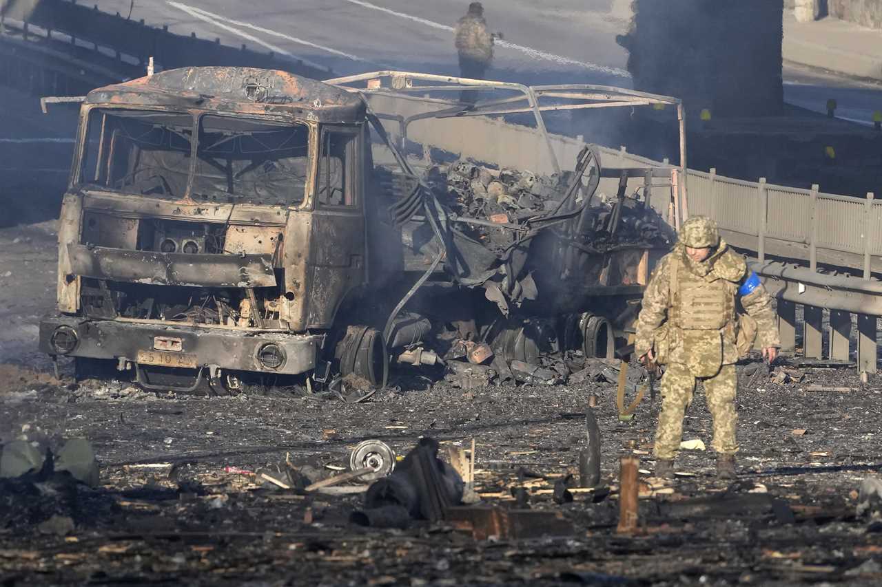 Ukrainian soldiers repel savage attack from Putin’s forces to defend vital road junction