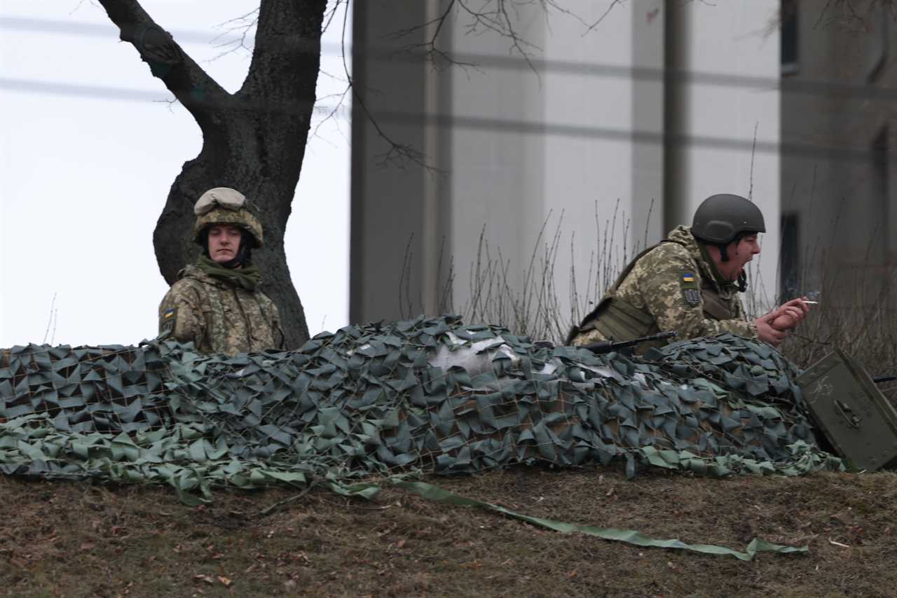 Ukrainian soldiers repel savage attack from Putin’s forces to defend vital road junction