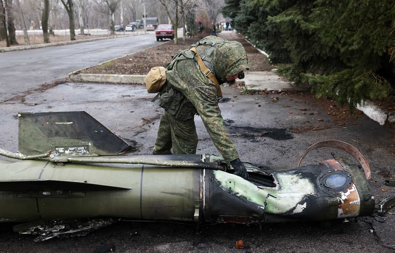 Ukrainian soldiers repel savage attack from Putin’s forces to defend vital road junction