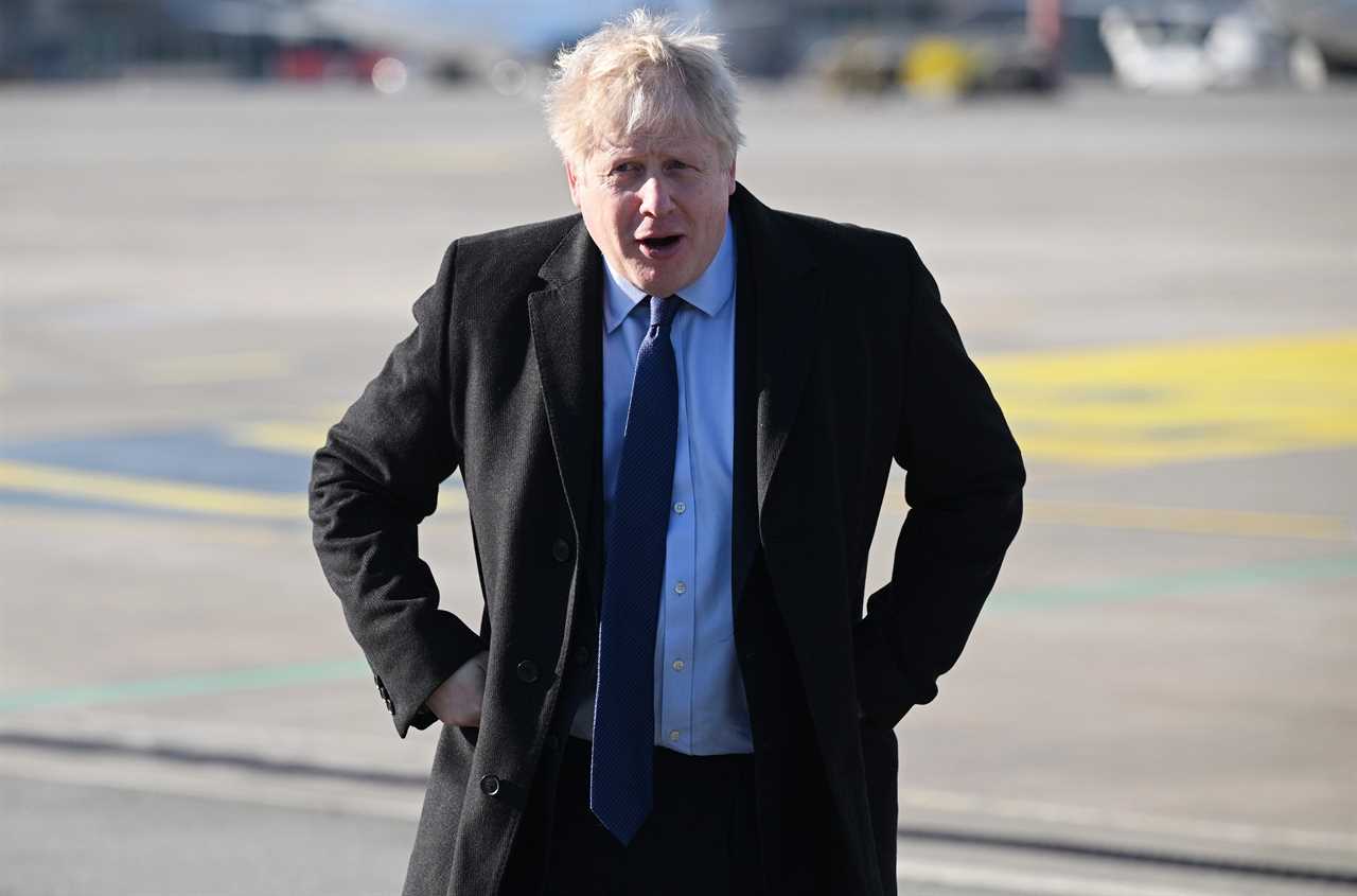 Boris Johnson lands in Poland for urgent security talks as Russian tanks rumble towards Kyiv