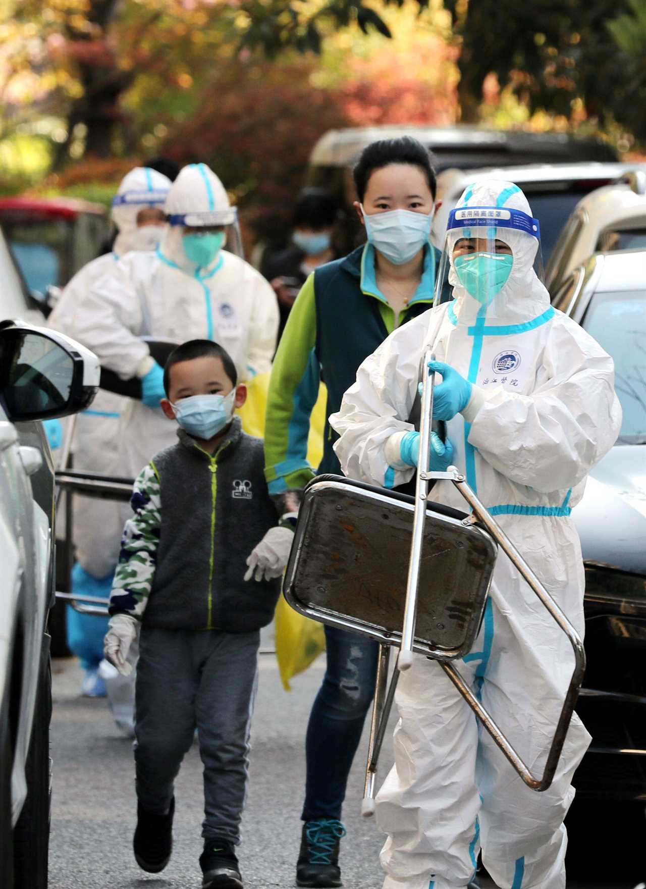 Inside world’s strictest lockdown as babies are separated from parents and Shanghai streets are left completely empty