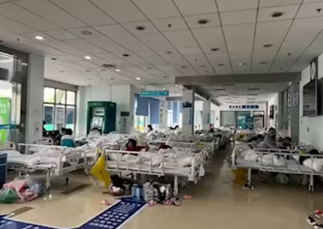 Inside world’s strictest lockdown as babies are separated from parents and Shanghai streets are left completely empty