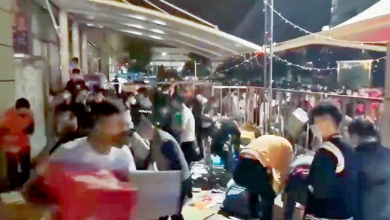 Starving shoppers loot Shanghai supermarket as China sends 26m into world’s strictest Covid lockdown