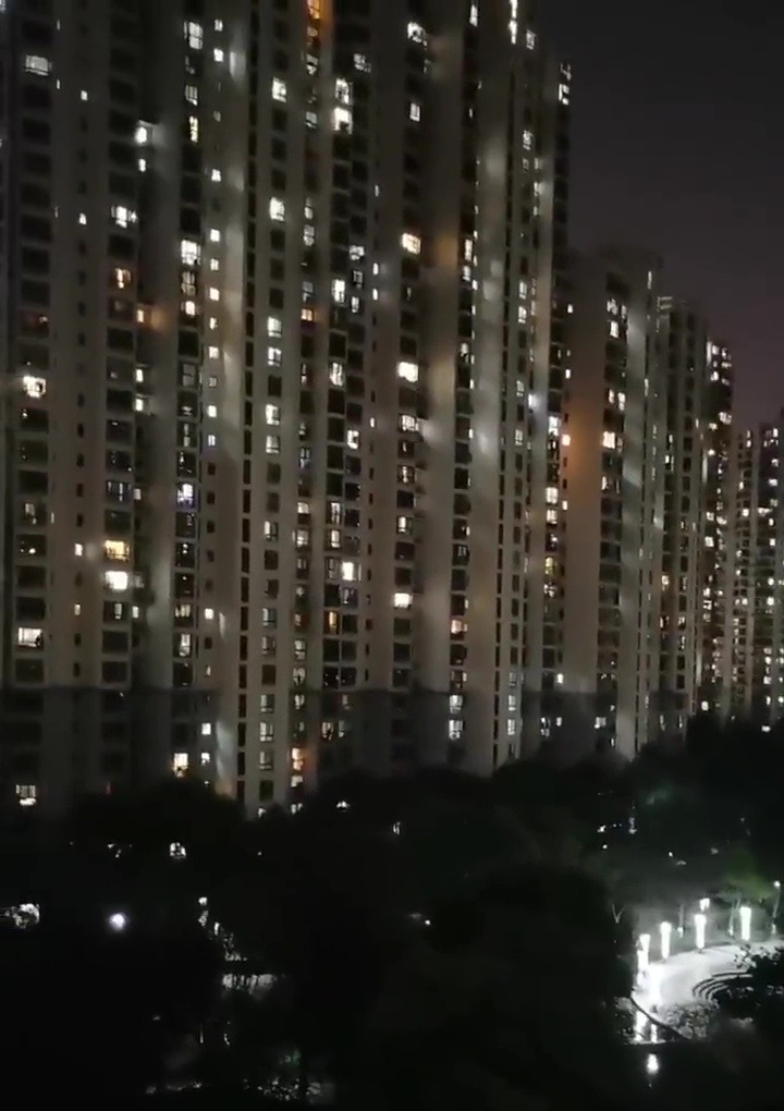 Eerie moment Shanghai residents scream out their windows after week imprisoned at home amid world’s strictest lockdown