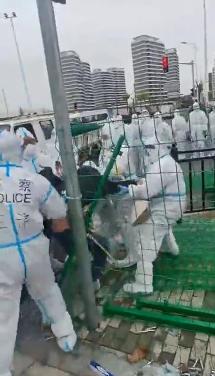 Chinese cops in hazmat gear seize people’s HOMES for use as Covid isolation units in world’s strictest lockdown