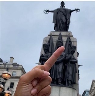 Fury as Labour election candidate posts picture of herself making obscene gesture at WAR MEMORIAL