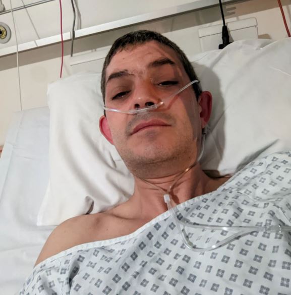 Merlin shared a selfie from his hospital bed earlier this week as he thanked the NHS for saving his life