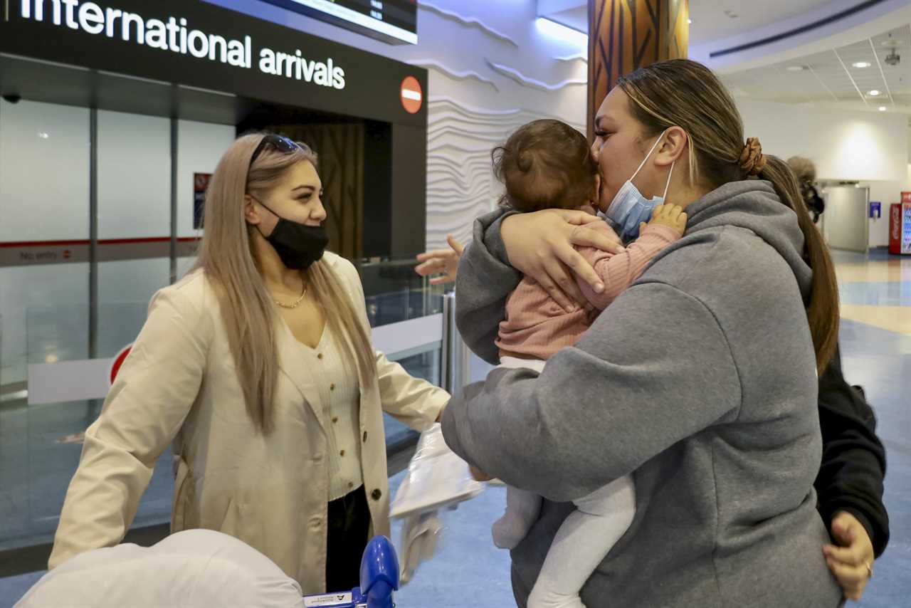 Families reunited at last after New Zealand finally reopens borders for first time since Covid