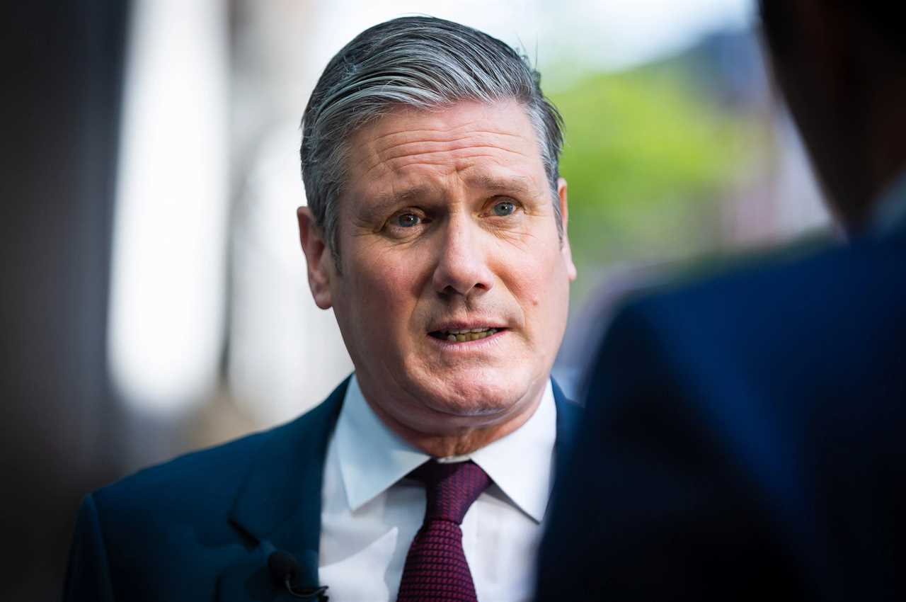 Under-fire Keir Starmer caught on camera flouting Covid rules at council tip by failing to wear mask