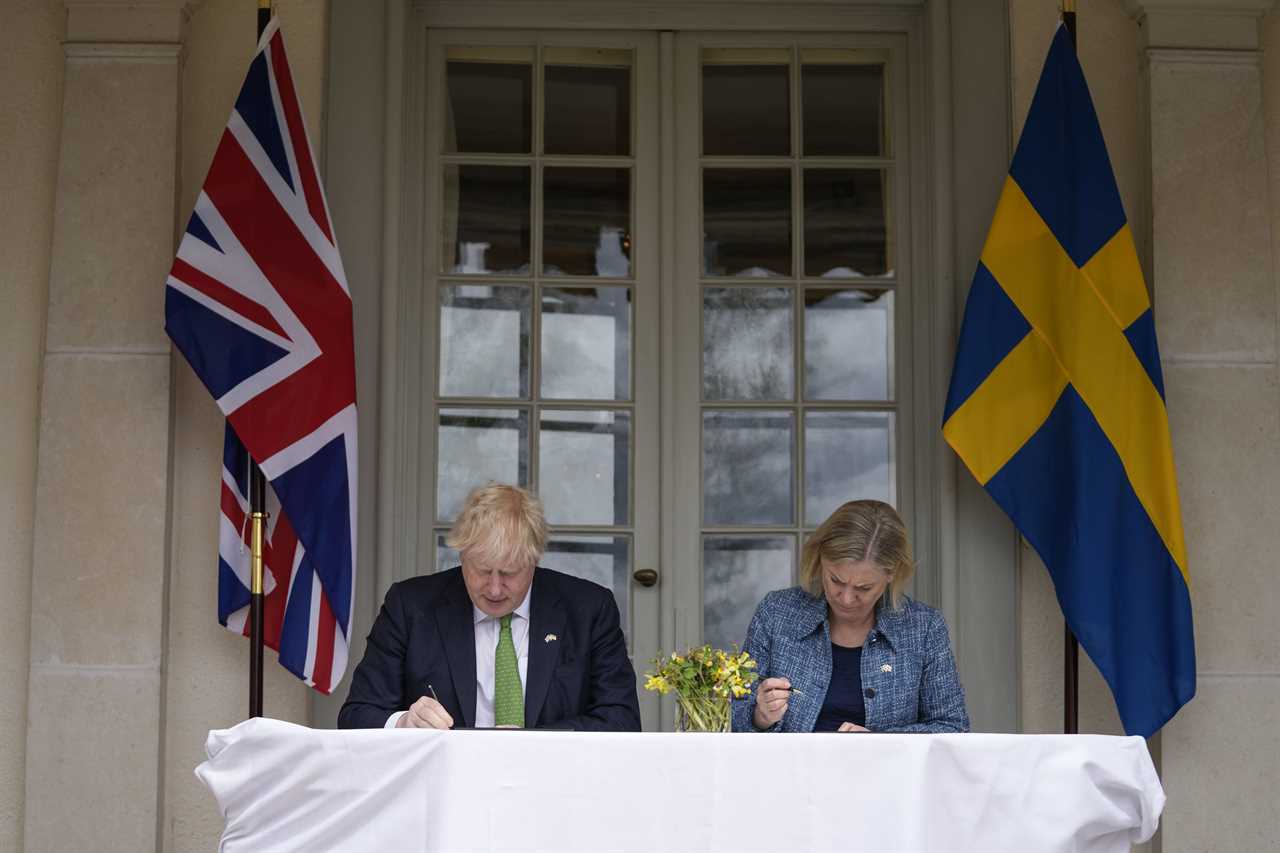Britain will deploy soldiers if Russia ever invades Finland or Sweden, Boris Johnson pledges