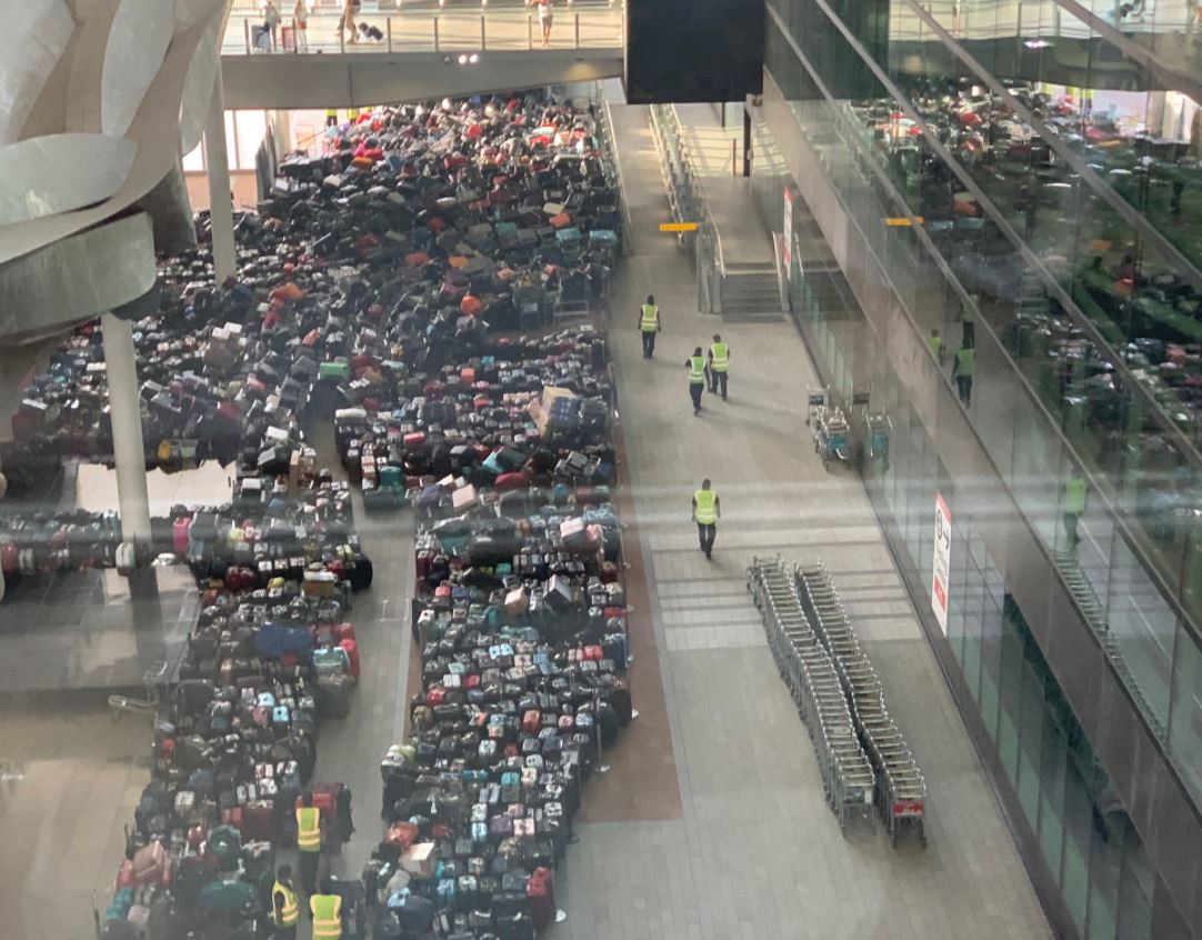 Hundreds of suitcases pile up in Heathrow Airport chaos as passengers told they may not get luggage back for two days