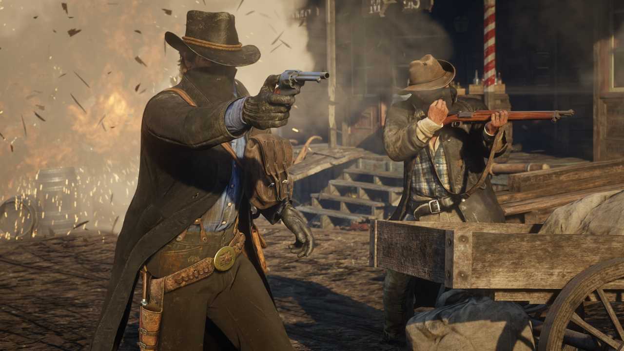 Two cowboys shoot in front of an explosion in Red Dead Redemption 2