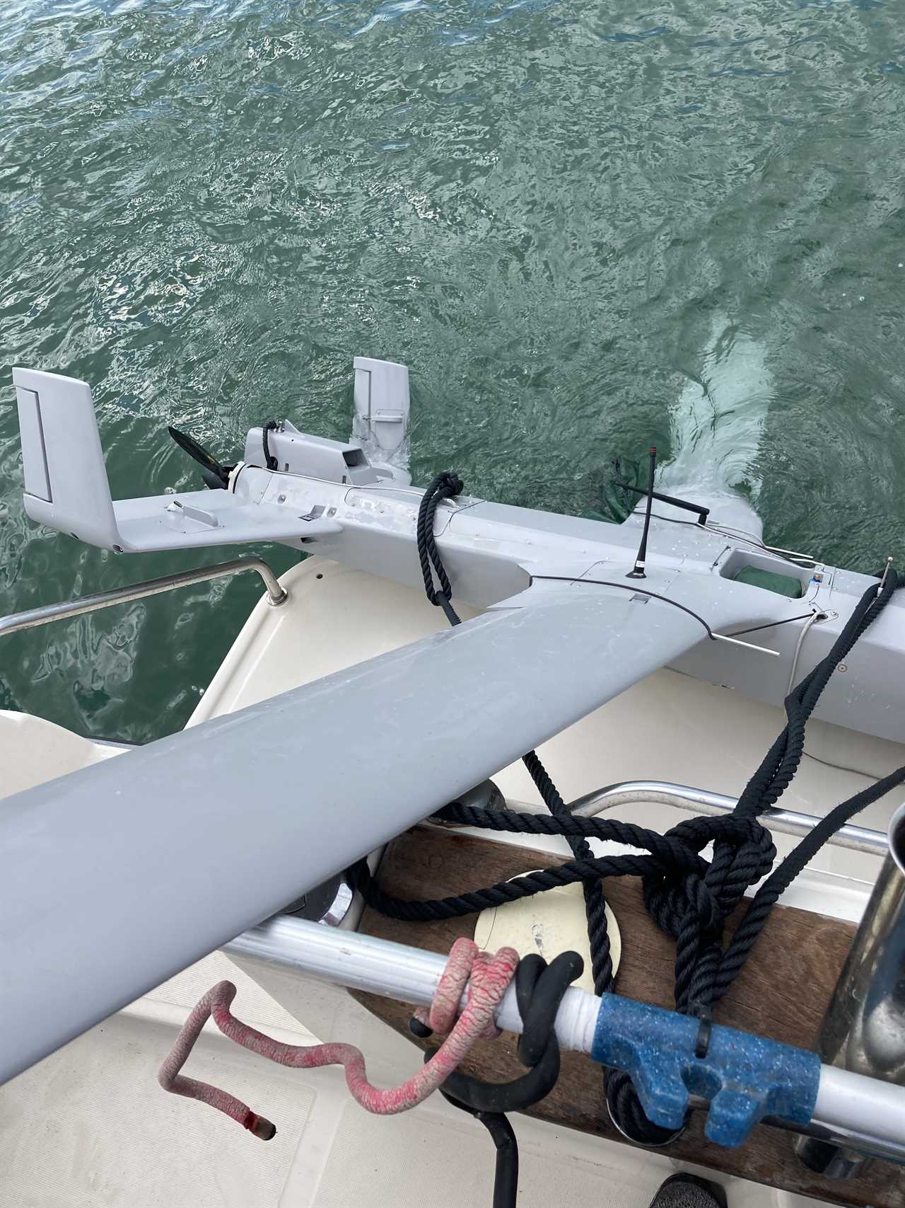 As hundreds of migrants wait to cross the Channel, a £420k drone designed to stop them falls into the sea