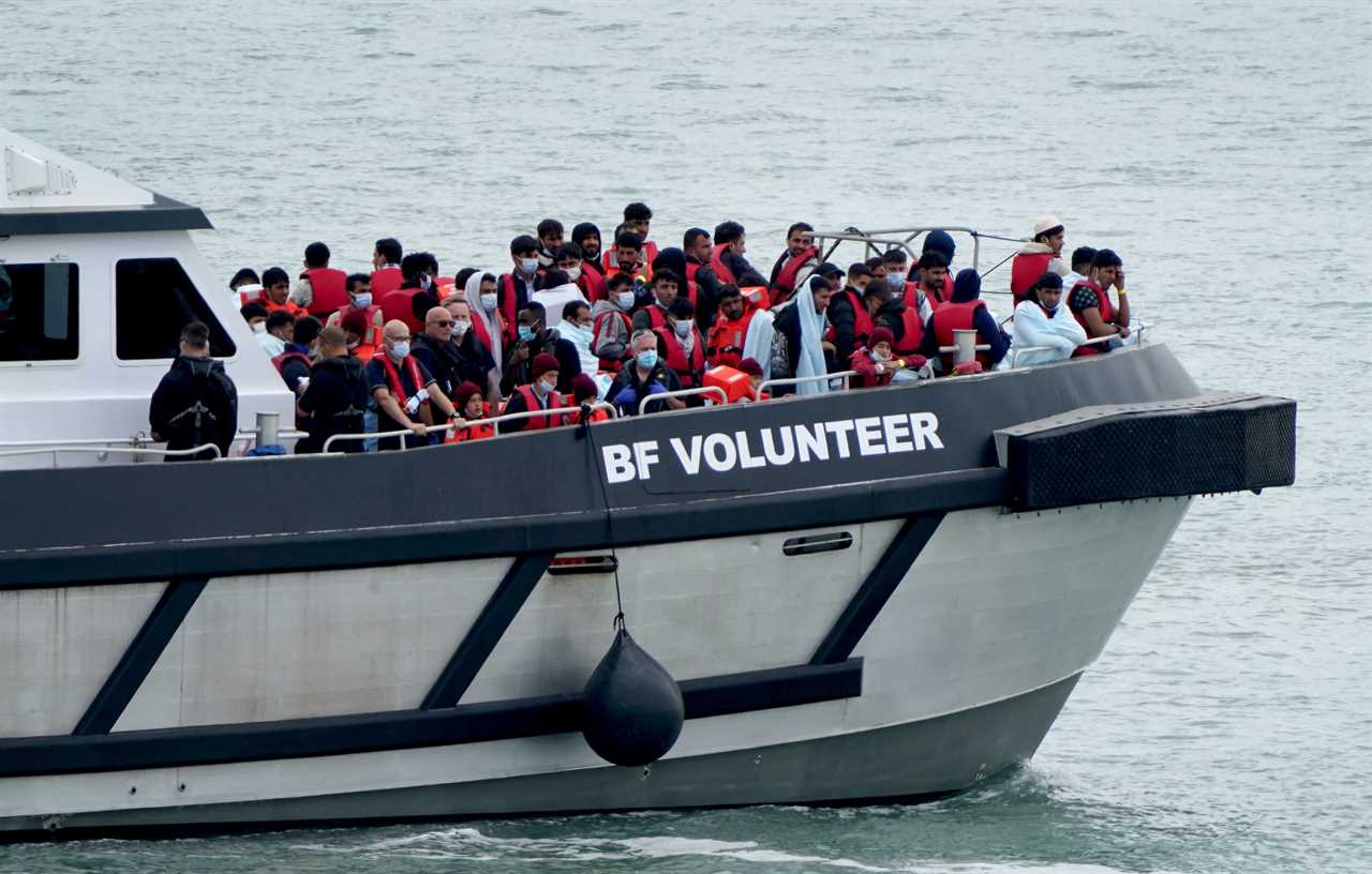 Record 696 migrants cross the channel in ONE day as 2022 total hits 17,000